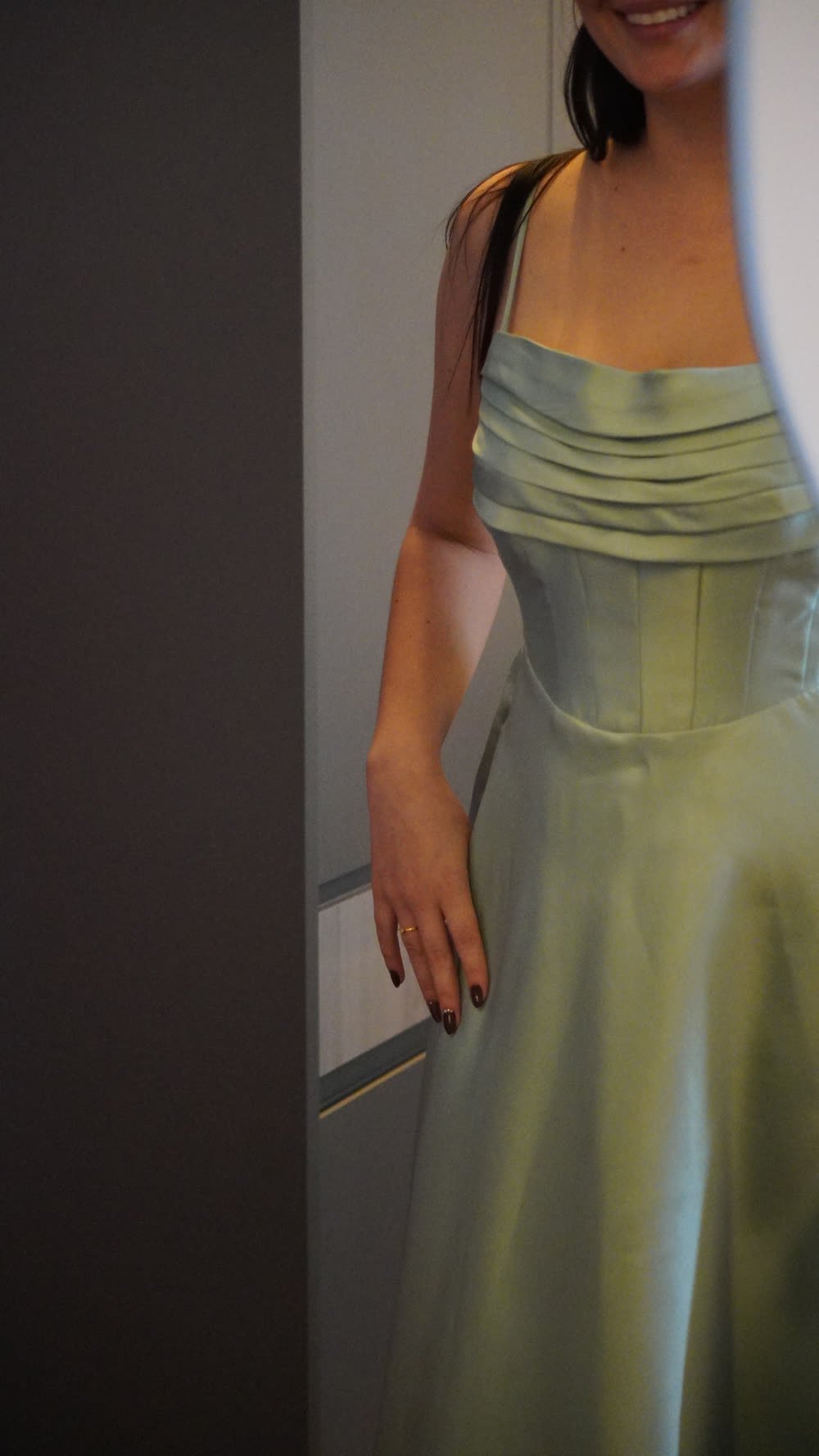 Cliente experimentando o vestido na primeira prova